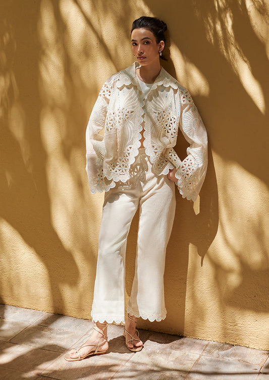 Nainpreet Edit '25 Ayla – ivory organza shirt with cutwork and scalloped hems. Model wears it with matching pants, a comfortable Indian festive set.