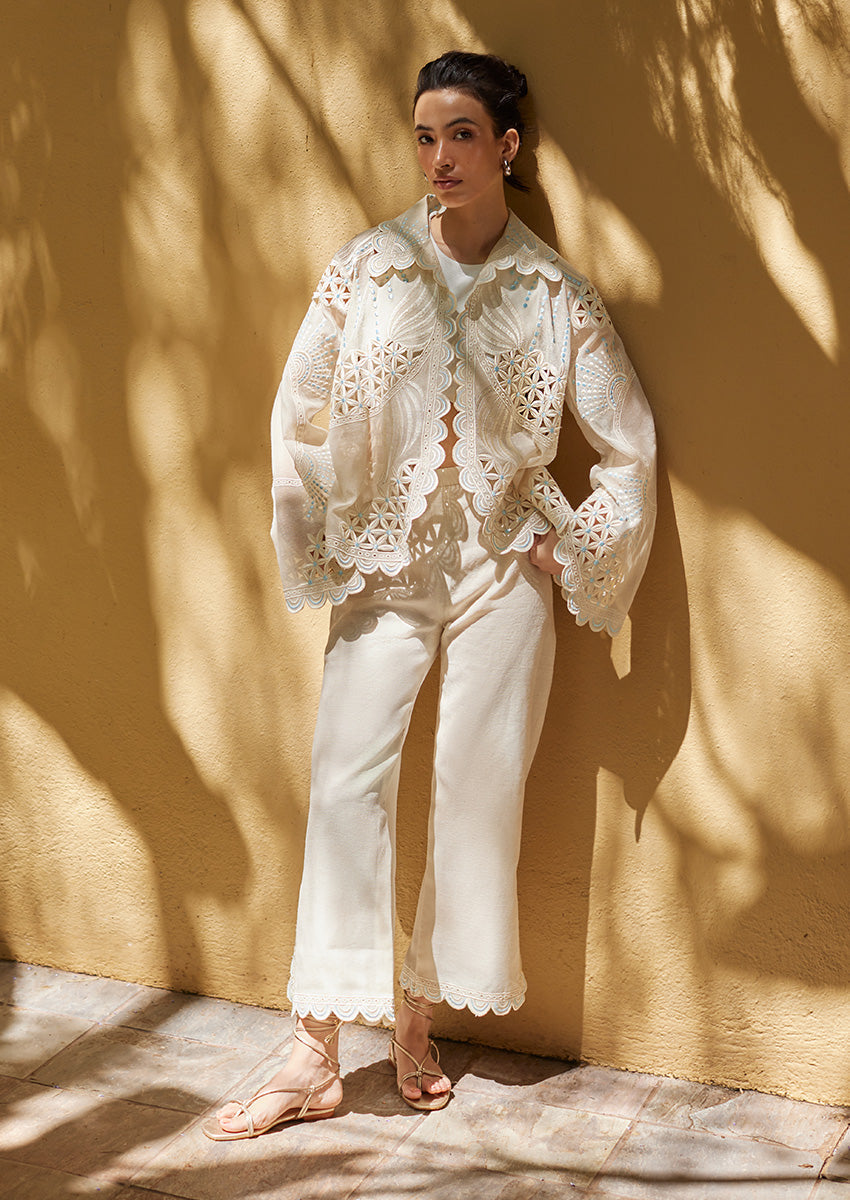 Nainpreet Edit '25 Ayla – ivory organza shirt with cutwork and scalloped hems. Model wears it with matching pants, a comfortable Indian festive set.